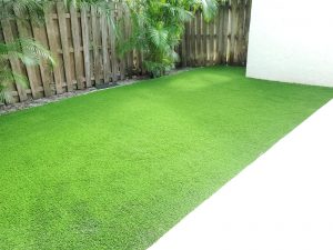 Synthetic grass installed in the side yard of a Tampa home 