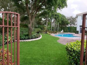 synthetic grass by the pool at a Boca Raton home 